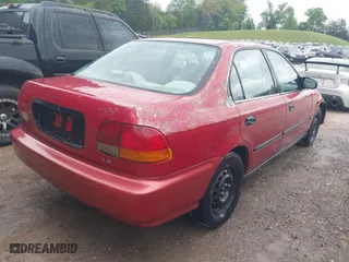 1997 Honda Civic LX "O" w/Air with VIN 1HGEJ6672VL019621, listed as a IAAI auction lot 42081226 with 194,957 mi miles. Bid and sale history available at carsss.com. Image 4.