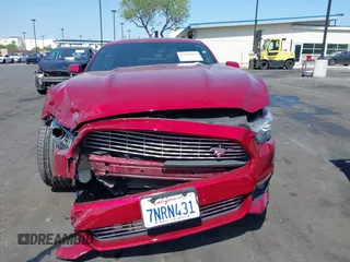 2016 Ford Mustang EcoBoost z VIN 1FA6P8THXG5252914, wystawiony jako IAAI lot #42184803 z przebiegiem 132 973 mil mil oraz . Historia ofert i sprzedaży dostępna na DreamBid. Obrazek 13.