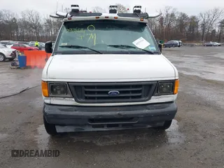 2004 Ford Econoline Cargo with VIN 1FTRE14W44HB53758, listed as a IAAI auction lot 40926124 with 139,104 mi miles. Bid and sale history available at carsss.com. Image 11.