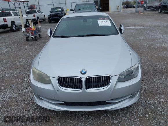 2011 BMW 3 Series 335i with VIN WBADX7C52BE581856, listed as a IAAI auction lot 41911781 with 130,606 mi miles and . Bid and sale history available at DreamBid. Image 6.