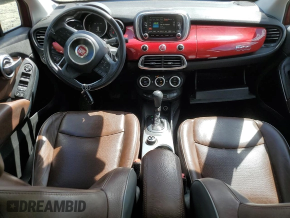 2016 FIAT 500X Lounge z VIN ZFBCFYDT4GP389082, wystawiony jako Copart lot #53291915 z przebiegiem 117 153 mil mil oraz Szkoda całkowita • Salvage title. Historia ofert i sprzedaży dostępna na DreamBid. Obrazek 8.