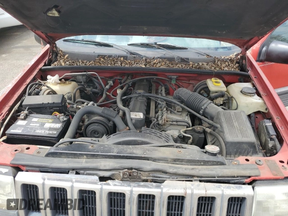 1994 Jeep Grand Cherokee Laredo с VIN 1J4GZ58S7RC311048, выставлен на аукционе Copart как лот 56759635 с пробегом 242 460 миль миль и Списание • Salvage title. История ставок и продаж доступна на DreamBid. Изображение 12.