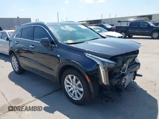2023 Cadillac XT4 FWD Luxury z VIN 1GYAZAR47PF145379, wystawiony jako IAAI lot #41861676 z przebiegiem 5 556 mil mil oraz . Historia ofert i sprzedaży dostępna na DreamBid. Obrazek 1.