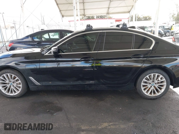 2021 BMW 5 Series 530e with VIN WBA13AG07MCF87003, listed as a IAAI auction lot 41550152 with 52,214 mi miles and . Bid and sale history available at carsss.com. Image 14.