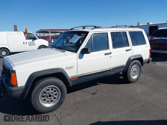 1996 Jeep Cherokee Sport with VIN 1J4FJ68S9TL234764, listed as a IAAI auction lot 41636731 with 129,732 mi miles. Bid and sale history available at carsss.com. Image 6.