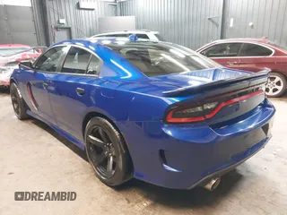 2022 Dodge Charger R/T with VIN 2C3CDXCT9NH127952, listed as a IAAI auction lot 42020401 with 55,483 mi miles and . Bid and sale history available at carsss.com. Image 3.
