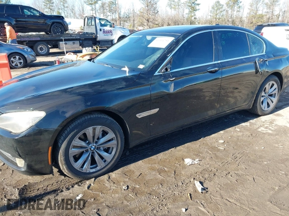 2011 BMW 7 Series 740i with VIN WBAKA4C58BC392020, listed as a IAAI auction lot 41314751 with 116,553 mi miles. Bid and sale history available at carsss.com. Image 6.