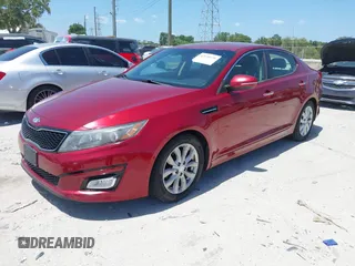 2014 Kia Optima LX with VIN 5XXGM4A75EG329546, listed as a IAAI auction lot 42159226 with 200,963 mi miles. Bid and sale history available at carsss.com. Image 2.