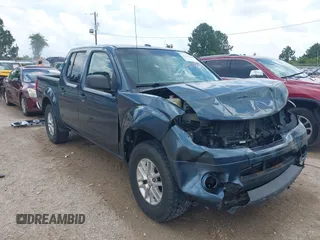2014 Nissan Frontier SV with VIN 1N6AD0ER7EN756108, listed as a IAAI auction lot 42167618 with 211,704 mi miles and . Bid and sale history available at DreamBid. Image 1.