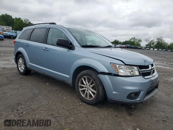2013 Dodge Journey SXT with VIN 3C4PDCBG0DT619382, listed as a Copart auction lot 56565205 with 176,112 mi miles and Salvage title. Bid and sale history available at DreamBid. Image 4.