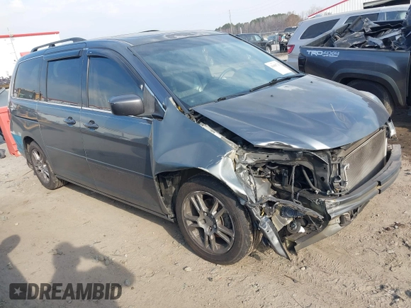 2010 Honda Odyssey EX-L with VIN 5FNRL3H7XAB099821, listed as a IAAI auction lot 41680729 with 217,458 mi miles and . Bid and sale history available at DreamBid. Image 1.