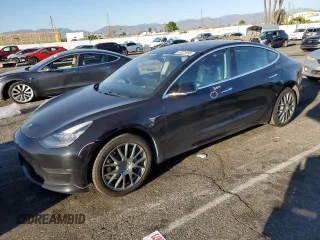 2018 Tesla Model 3 Long Range Battery with VIN 5YJ3E1EA6JF070935, listed as a Copart auction lot 45031095 with 121,111 mi miles and Salvage Title. Bid and sale history available at carsss.com. Image 1.