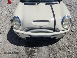 2006 MINI Hardtop S with VIN WMWRE33556TJ38543, listed as a Copart auction lot 62420145 with 105,656 mi miles and Salvage title. Bid and sale history available at DreamBid. Image 11.