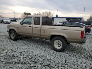 1991 Ford Ranger with VIN 1FTCR15TXMPA56374, listed as a Copart auction lot 47278065 with 64,948 mi miles and Clean Title. Bid and sale history available at DreamBid. Image 2.