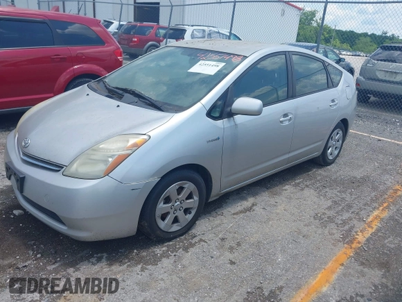 2007 Toyota Prius z VIN JTDKB20U277563022, wystawiony jako IAAI lot #42551498 z przebiegiem 228 017 mil mil oraz . Historia ofert i sprzedaży dostępna na DreamBid. Obrazek 2.
