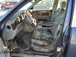 2005 Bentley Arnage R z VIN SCBLC37F65CX10805, wystawiony jako Copart lot #80332124 z przebiegiem Nie podano mil oraz Nie do naprawy. Historia ofert i sprzedaży dostępna na DreamBid. Obrazek 7.