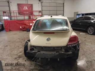 2019 Volkswagen Beetle S with VIN 3VWFD7ATXKM705322, listed as a IAAI auction lot 41409600 with 97,479 mi miles. Bid and sale history available at carsss.com. Image 17.