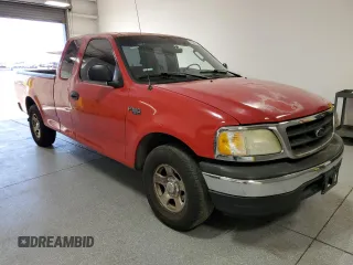 2002 Ford F-150 XL with VIN 1FTRX17212KE07302, listed as a Copart auction lot 49720995 with 205,171 mi miles and Clean Title. Bid and sale history available at carsss.com. Image 1.