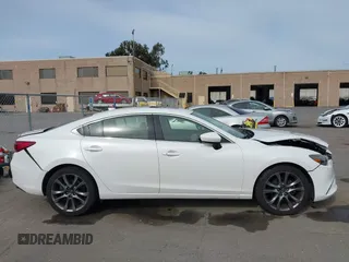 2016 Mazda Mazda6 i Grand Touring with VIN JM1GJ1W51G1444867, listed as a IAAI auction lot 41988597 with 86,844 mi miles. Bid and sale history available at carsss.com. Image 13.