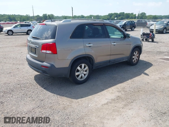 2011 Kia Sorento LX with VIN 5XYKT4A1XBG061125, listed as a IAAI auction lot 42576972 with 201,187 mi miles and . Bid and sale history available at DreamBid. Image 4.