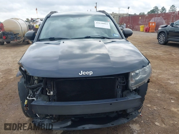 2014 Jeep Compass Sport with VIN 1C4NJCBA1ED725875, listed as a IAAI auction lot 42118863 with 133,136 mi miles. Bid and sale history available at carsss.com. Image 13.