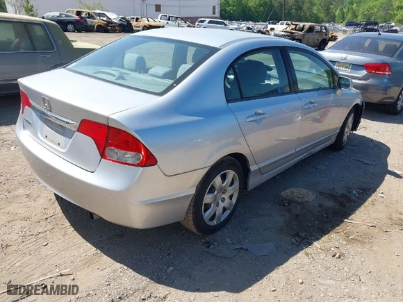 2009 Honda Civic Sdn LX with VIN 2HGFA16529H319443, listed as a IAAI auction lot 42065285 with 92,900 mi miles. Bid and sale history available at carsss.com. Image 4.