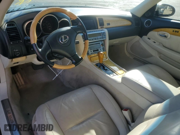 2002 Lexus SC 430 with VIN JTHFN48Y120027674, listed as a Copart auction lot 71220864 with 135,125 mi miles and Salvage Title. Bid and sale history available at DreamBid. Image 8.