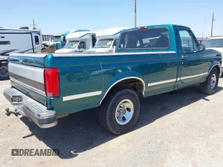 1996 Ford F-150 Special with VIN 1FTEF15N2TLA07520, listed as a IAAI auction lot 42005555 with 184,260 mi miles. Bid and sale history available at carsss.com. Image 4.