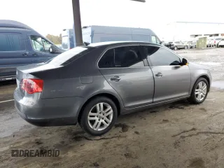 2007 Volkswagen Jetta z VIN 3VWDG71K47M101262, wystawiony jako Copart lot #51469695 z przebiegiem 241 174 mil mil oraz Szkoda całkowita • Salvage title. Historia ofert i sprzedaży dostępna na DreamBid. Obrazek 3.