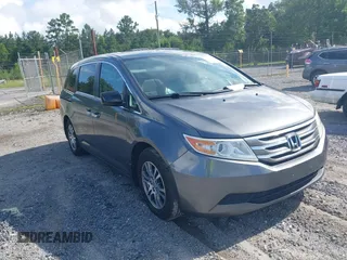 2012 Honda Odyssey EX-L with VIN 5FNRL5H60CB073976, listed as a IAAI auction lot 42757536 with 228,669 mi miles and . Bid and sale history available at DreamBid. Image 1.