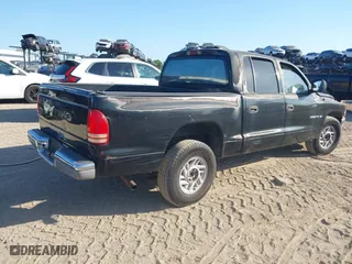 2000 Dodge Dakota Sport with VIN 1B7GL2AN2YS776819, listed as a IAAI auction lot 42066658 with 250,880 mi miles. Bid and sale history available at carsss.com. Image 4.