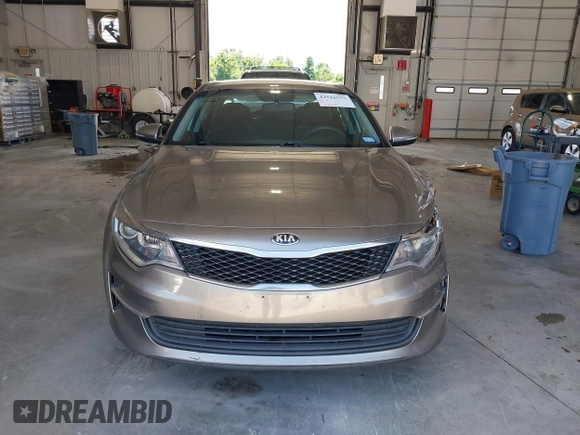 2018 Kia Optima S with VIN 5XXGT4L35JG209561, listed as a IAAI auction lot 42526577 with 161,906 mi miles and . Bid and sale history available at DreamBid. Image 12.