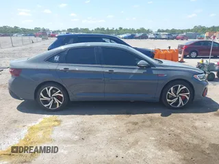 2023 Volkswagen Jetta GLI Autobahn with VIN 3VW2T7BU0PM001596, listed as a IAAI auction lot 42120162 with 72,778 mi miles and . Bid and sale history available at DreamBid. Image 13.