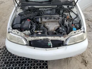 1999 Acura CL z VIN 19UYA325XXL009809, wystawiony jako Copart lot #73392444 z przebiegiem 79 668 mil mil oraz Szkody całkowita. Historia ofert i sprzedaży dostępna na DreamBid. Obrazek 11.
