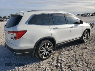 2022 Honda Pilot Touring 7-Passenger with VIN 5FNYF5H65NB011768, listed as a Copart auction lot 74134503 with 27,517 mi miles and Salvage title. Bid and sale history available at DreamBid. Image 3.