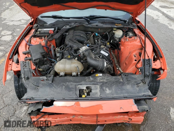 2015 Ford Mustang V6 z VIN 1FA6P8AM6F5388679, wystawiony jako Copart lot #58469525 z przebiegiem 69 819 mil mil oraz Szkoda całkowita • Salvage title. Historia ofert i sprzedaży dostępna na DreamBid. Obrazek 11.