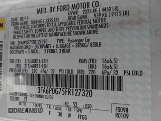 2015 Ford Fusion S with VIN 3FA6P0G75FR127320, listed as a IAAI auction lot 41868697 with 150,858 mi miles. Bid and sale history available at carsss.com. Image 9.