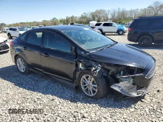 2017 Ford Focus SE with VIN 1FADP3F24HL248615, listed as a Copart auction lot 50526875 with 96,008 mi miles and Salvage Title. Bid and sale history available at DreamBid. Image 4.