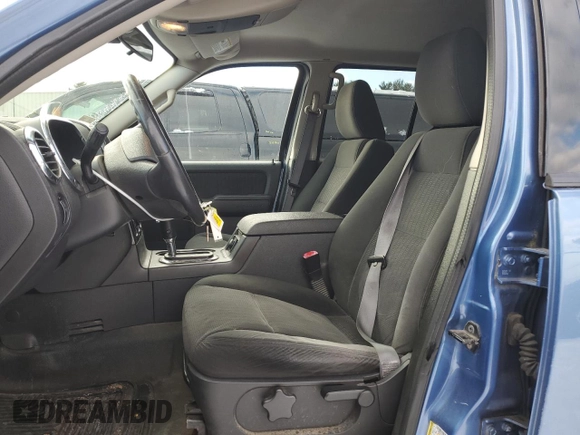 2009 Ford Explorer Sport Trac XLT with VIN 1FMEU51EX9UA39066, listed as a Copart auction lot 44100175 with 59,439 mi miles and Salvage title. Bid and sale history available at DreamBid. Image 7.
