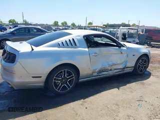2013 Ford Mustang V6 with VIN 1ZVBP8AM4D5212653, listed as a IAAI auction lot 42090402 with 134,437 mi miles. Bid and sale history available at carsss.com. Image 6.