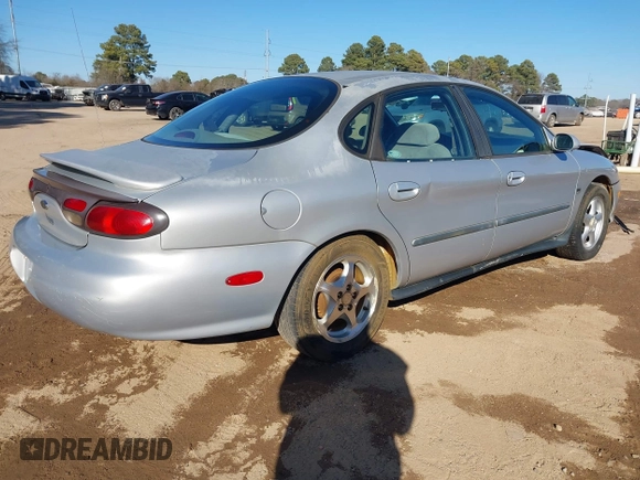 1999 Ford Taurus SE with VIN 1FAFP53S6XA322930, listed as a IAAI auction lot 41422655 with 189,696 mi miles. Bid and sale history available at carsss.com. Image 4.