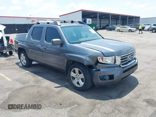 2013 Honda Ridgeline RTL z VIN 5FPYK1F5XDB012354, wystawiony jako IAAI lot #42392921 z przebiegiem 248 223 mil mil oraz . Historia ofert i sprzedaży dostępna na DreamBid. Obrazek 1.
