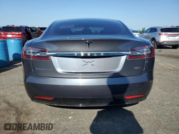 2017 Tesla Model S 100D с VIN 5YJSA1E2XHF185516, выставлен на аукционе Copart как лот 61816135 с пробегом 132 267 миль миль и Списание • Salvage title. История ставок и продаж доступна на DreamBid. Изображение 6.