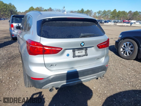 2018 BMW X1 xDrive28i with VIN WBXHT3C30J5L29757, listed as a IAAI auction lot 41879504 with 60,490 mi miles. Bid and sale history available at carsss.com. Image 16.