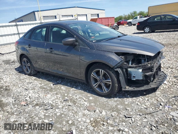 2018 Ford Focus SE с VIN 1FADP3FE5JL312063, выставлен на аукционе Copart как лот 53882065 с пробегом 82 743 миль миль и Списание • Salvage title. История ставок и продаж доступна на DreamBid. Изображение 4.