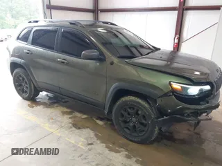 2020 Jeep Cherokee Trailhawk Elite z VIN 1C4PJMBN2LD538076, wystawiony jako IAAI lot #42219282 z przebiegiem 53 773 mil mil oraz . Historia ofert i sprzedaży dostępna na DreamBid. Obrazek 1.