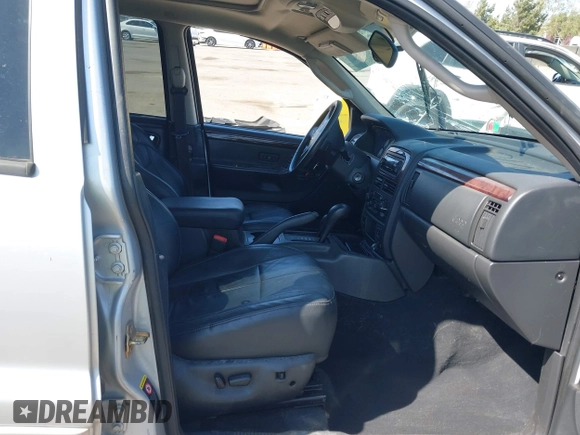 2004 Jeep Grand Cherokee Limited with VIN 1J8GW58N44C390592, listed as a IAAI auction lot 42150161 with Not provided miles and . Bid and sale history available at DreamBid. Image 5.