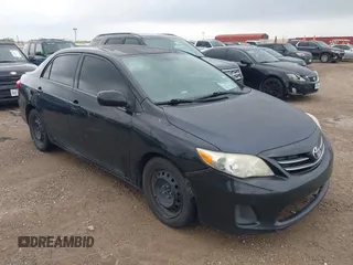 2013 Toyota Corolla L with VIN 2T1BU4EE6DC935978, listed as a IAAI auction lot 42111995 with 200,152 mi miles. Bid and sale history available at carsss.com. Image 1.