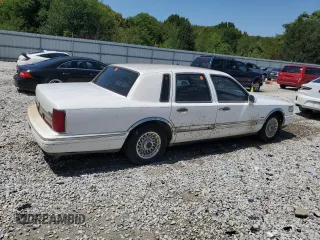 1996 Lincoln Town Car Executive z VIN 1LNLM81W4TY641611, wystawiony jako Copart lot #44939405 z przebiegiem 296 702 mil mil oraz Szkoda całkowita • Salvage title. Historia ofert i sprzedaży dostępna na DreamBid. Obrazek 3.