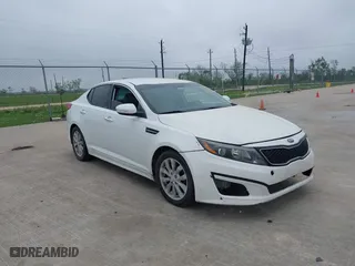 2015 Kia Optima EX with VIN 5XXGN4A76FG491572, listed as a IAAI auction lot 41940147 with 119,770 mi miles. Bid and sale history available at carsss.com. Image 1.